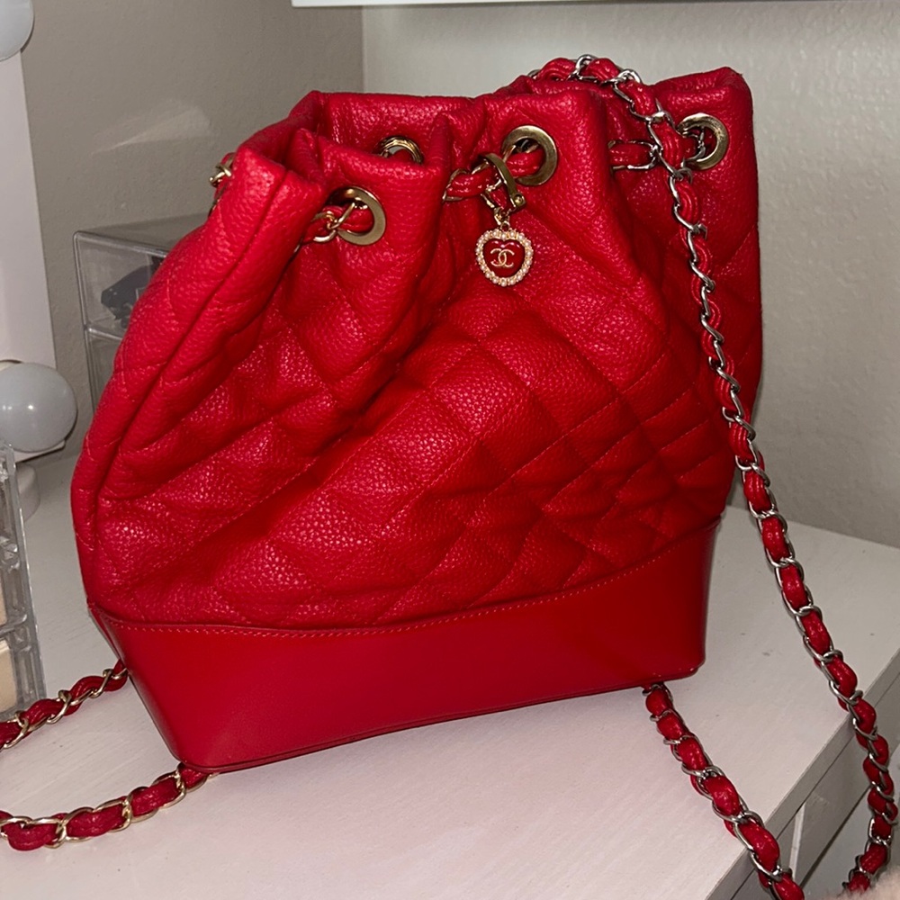 Red quilted backpack